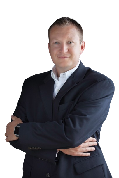Michael Conway, owner of Bellwether Agency, standing with arms crossed in a dark suit